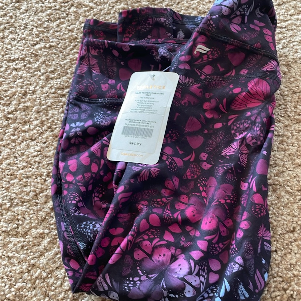 Brand new Fabletics leggings, cropped style in purple and blue butterfly pattern